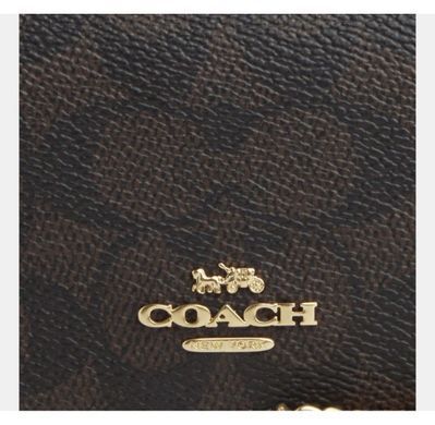 Жіноча міні сумка-гаманець Coach Mini Wallet On A Chain In Signature Canvas